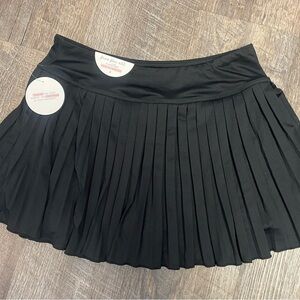 Women’s medium NWT black pleated skort with built in bike shorts